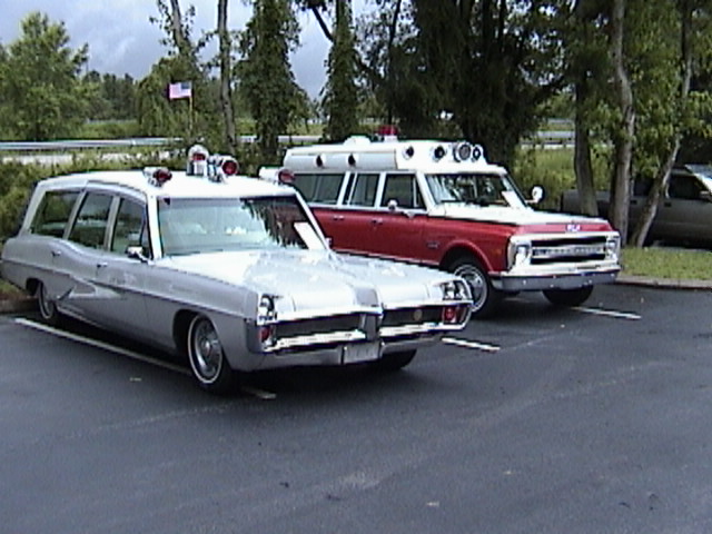 These two cars were parked side by side as their owners swapped ownership.  The Suburban went to Paris Island (see link).  The Pontiac is on a professional car chassis made by Superior Coach.  It is a combo car which means the floor quadrants can flip over converting from ambulance to hearse (rollers).  The prior owner was a USN Commander and restored it as a USN ambulance.